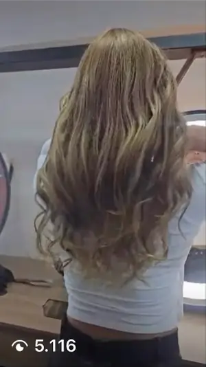 Reel do Marrom Chic Studio mostrando o resultado de um alongamento de cabelo, com 5.116 visualizações.